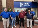 In attendance were [L to R] Jimmy Russ, AB4KA, of the West Central Florida Section; Craig McVeay, NØCSM, of the Nevada Section; Jay Ballinger, N6SAC, of the Sacramento Valley Section; Ralph Katz, AA8RK of the Michigan Section; Barry Buelow, WØIY, of the Iowa Section; David Overton, W5JDO, of the West Texas Section; Nomar Vizcarrondo, NP4H, of the Northern New Jersey Section; and Don Lynn, ND7L, of the Idaho Section. 