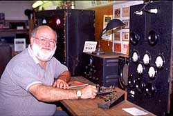 Mobile museum curator John Dilks, K2TQN, at the operating position of his 1933 classic ham station. Dilks is an ARRL Life Member and on the Board of the Antique Wireless Association.